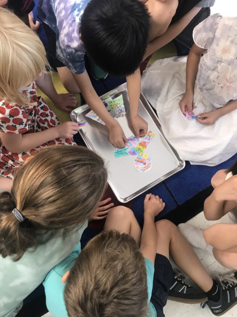 Several students working together on a community puzzle